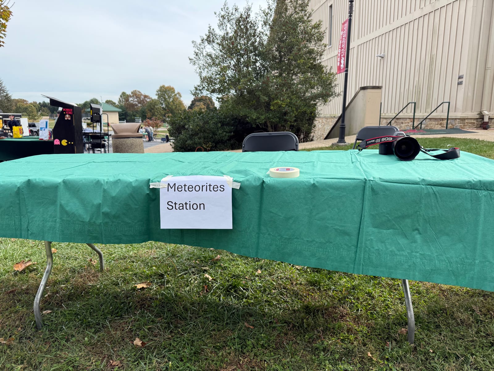 A table with a sign reading Meteorites Station